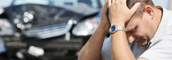 Chiropractic Portland OR Auto Accident Man Head Pain